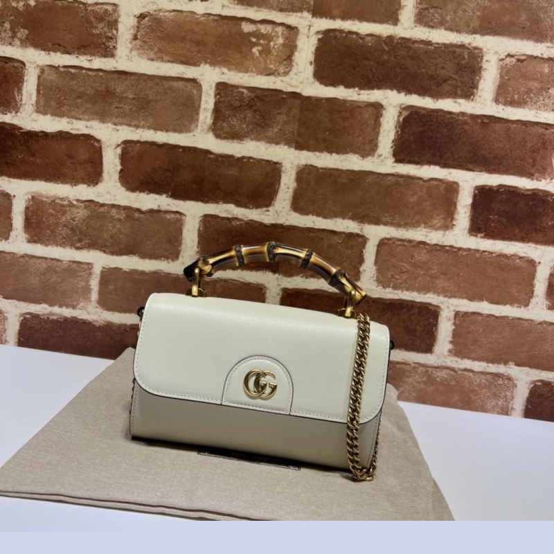 G*u*i top handle bags
